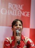 Katrina Kaif dons the red jersey for an Royal Challenge promotional event...
